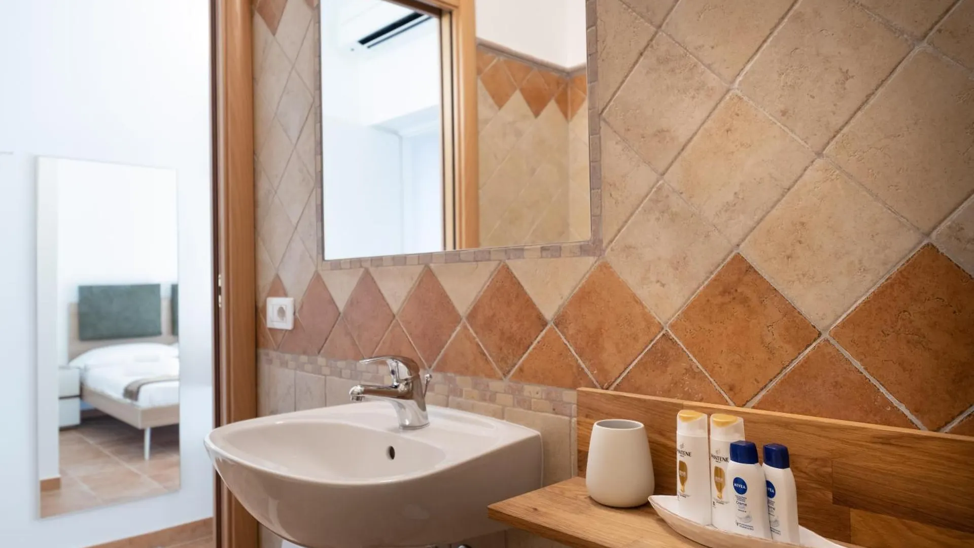 Гостевой дом Nautika Suites Альгеро